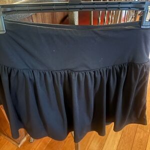 Athletic skirt w built in shorts. Black, nwt large, tennis, walking